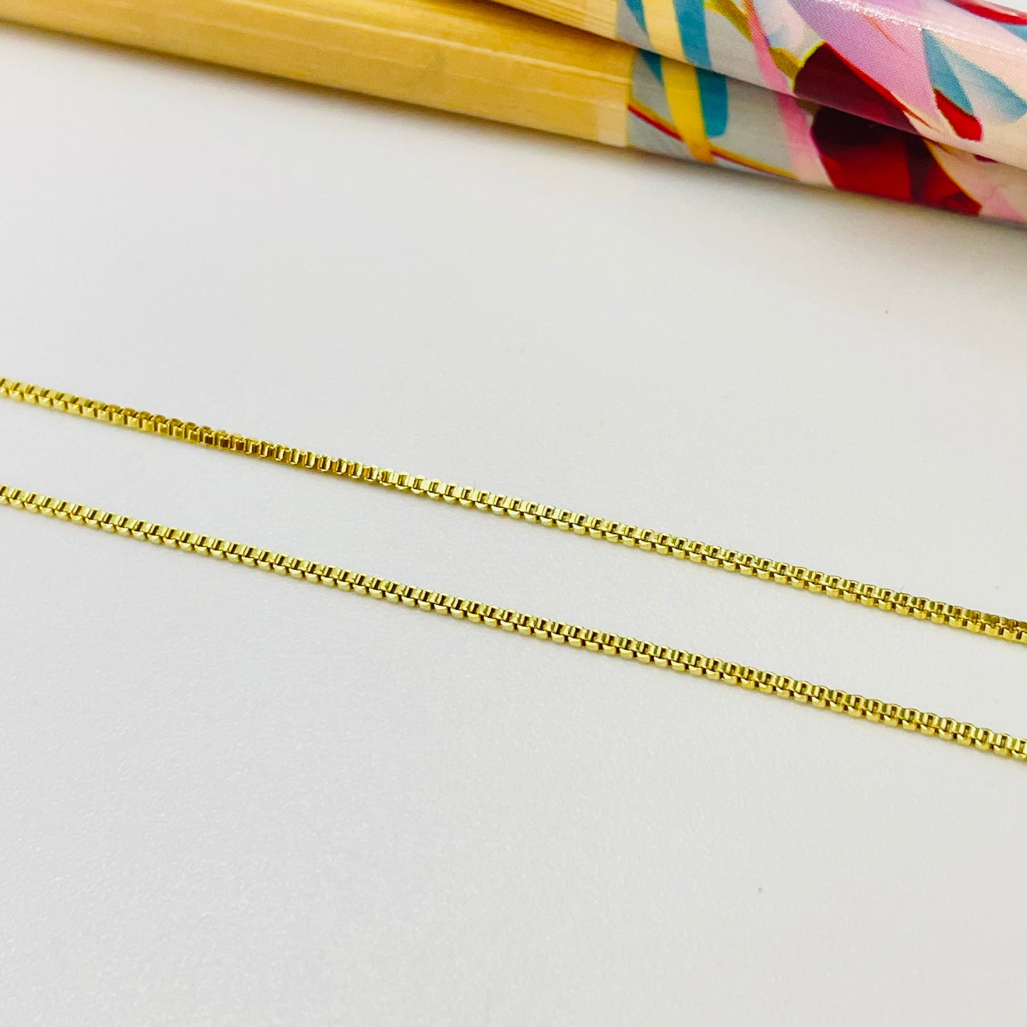 Joyas por Mayor Joyas Bañadas en Oro por Mayor Insumos para Joyas CO209 Cadena Veneciana de 1mm con bolita con silicona y palito Cadena Terminada Baño Oro