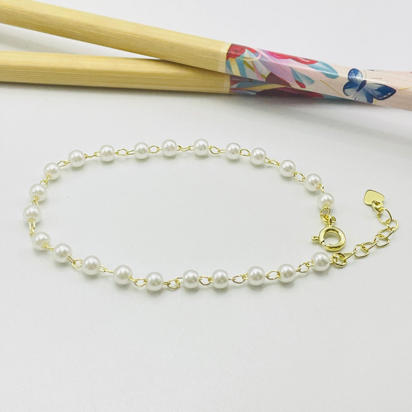 Joyas por Mayor Joyas Bañadas en Oro por Mayor Insumos para Joyas PO26 Pulsera Perlas diá. 4 mm y cadena Largo 17.5 mm más extensor de 3 cm con terminal mini corazón Pulsera Baño Oro