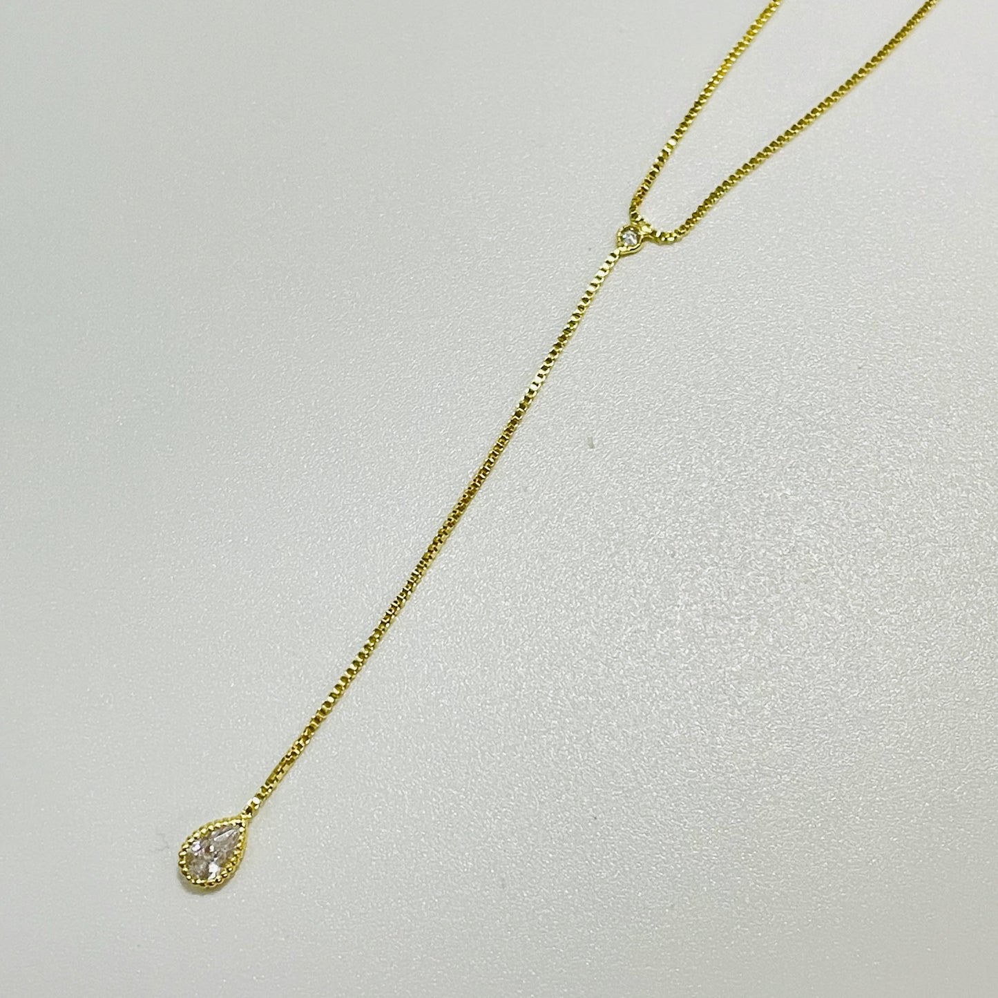 CO39-Cascada-Punto-de-Luz-Gota-Cadena-Baño-Oro