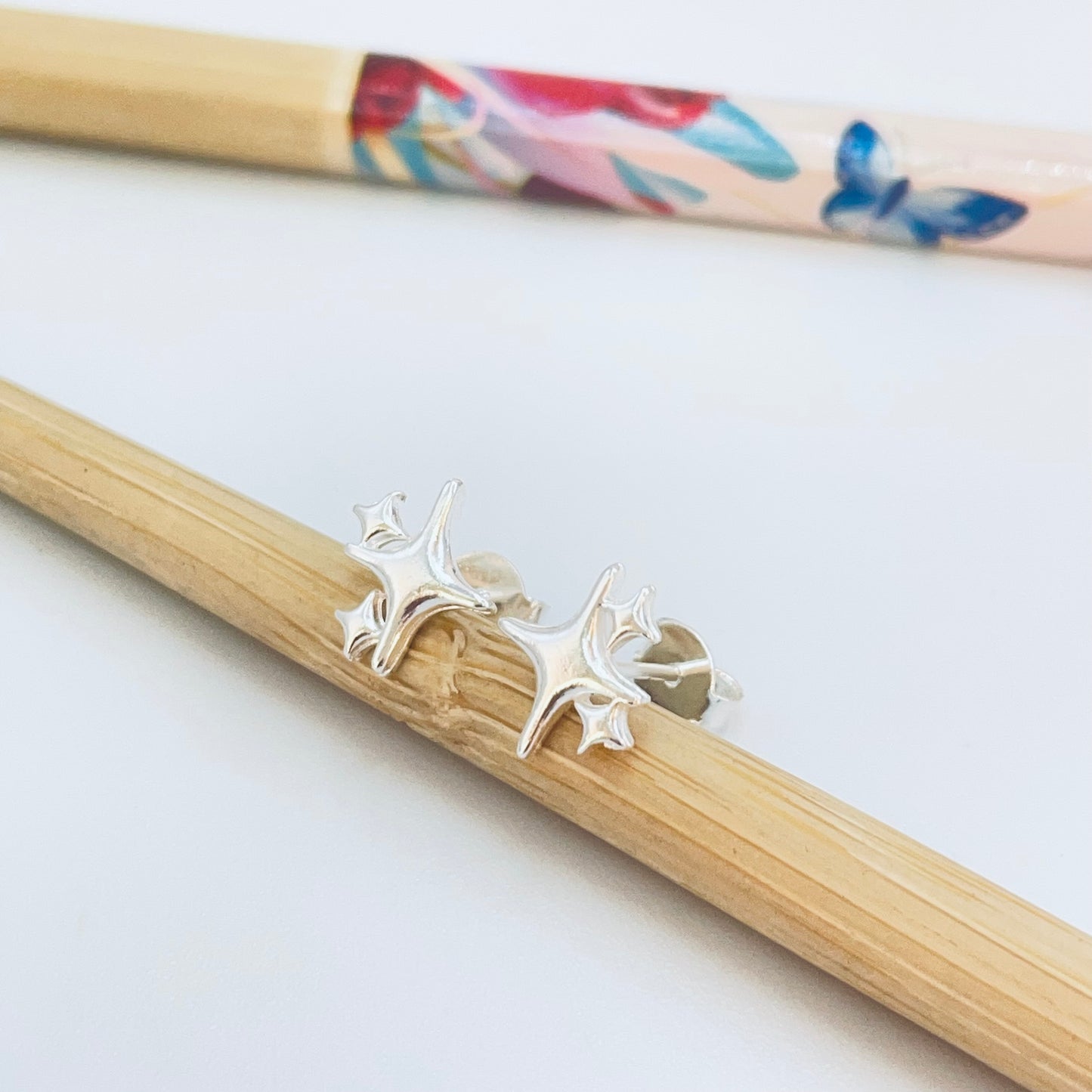 XP554 Aro Trio Estrellas 4 Puntas Liso 11 x 9 mm Espesor 1.5 mm Aro Baño Plata