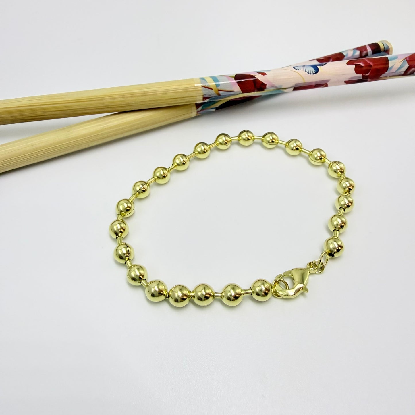 PO41 Pulsera Bolitas diá. 5 mm y Tubitos 1.2 mm Largo Total 18 cm Pulsera Baño Oro