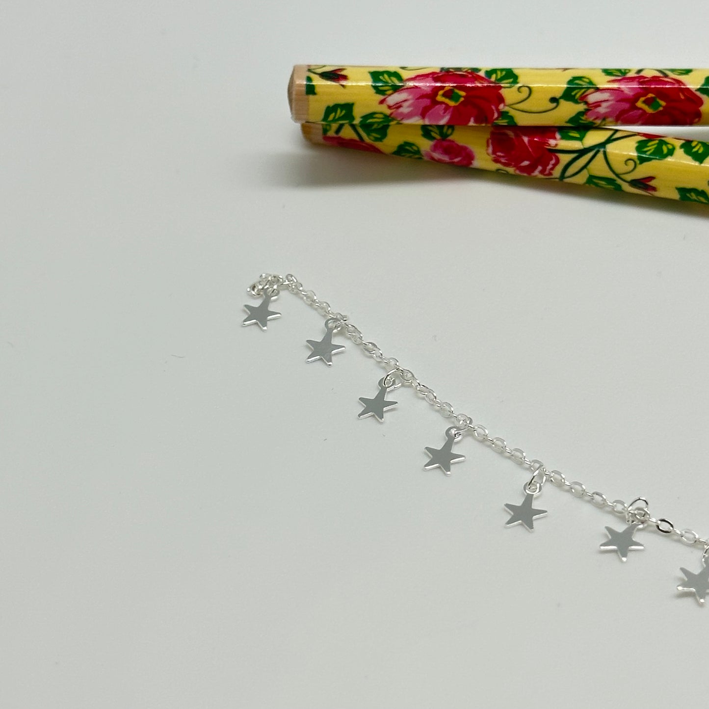 CP153 Cadena candado con estrellitas de 5 mm colgantes separadas por 10 mm Cadena por Metro Baño Plata