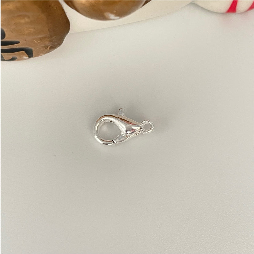 AP104 Broche Langosta 10 mm Accesorio Baño Plata Accesorios Bañados en Oro y Plata hecho de Bronce Bañado en Plata 50 ml