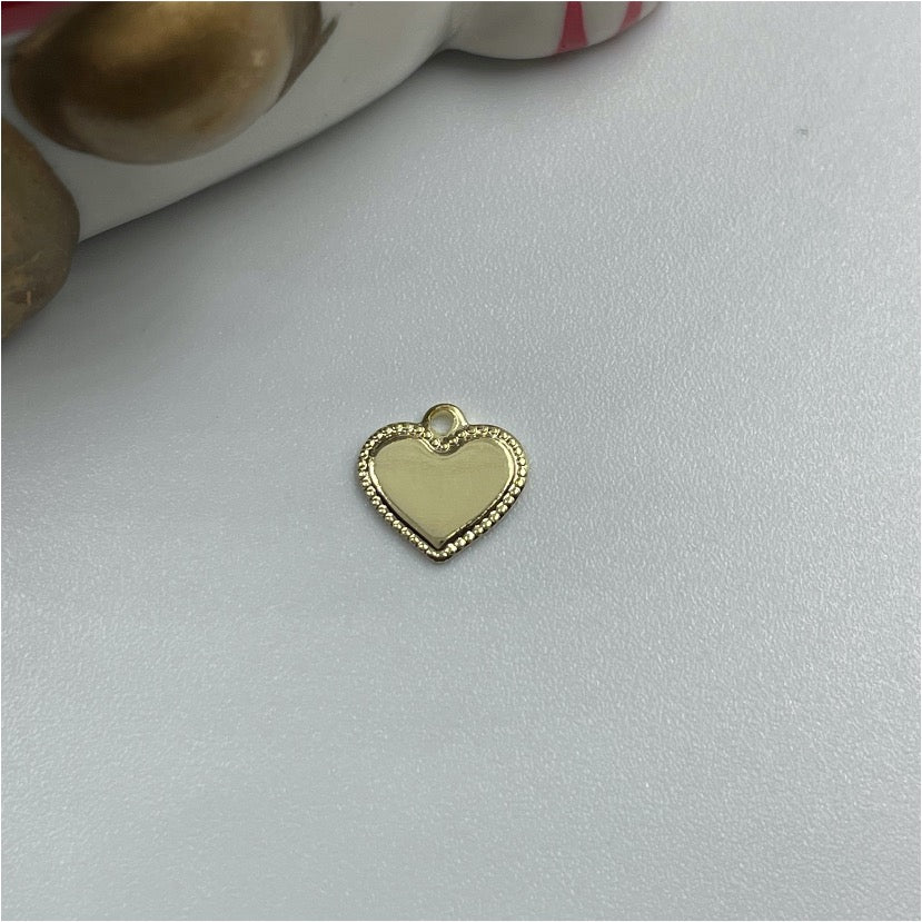 FO741 Colgante Corazón Liso con Borde reticulado 7 mm Figura Baño Oro Figuras Bañadas en Oro y Plata hecho de Bronce Bañado en Oro 18K Joyas Bañadas en Oro