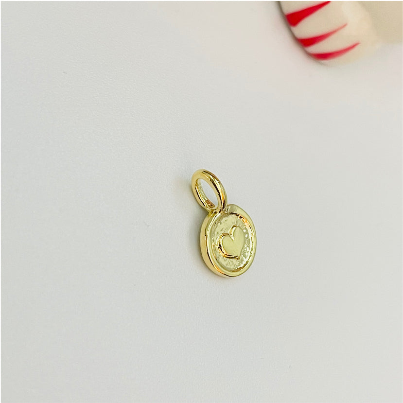 FO827 Colgante Mini Redondo Corazón en relieve 9 mm mas argollita Figura Baño Oro Figuras Bañadas en Oro y Plata hecho de Bronce Bañado en Oro 18K