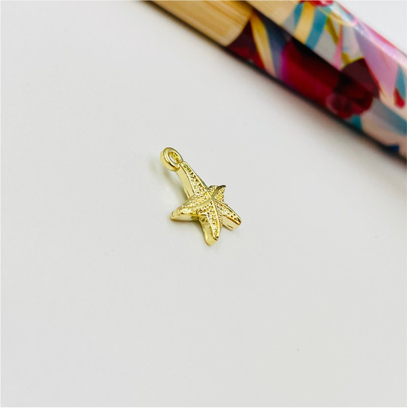 FO882 Colgante Estrella de Mar 10x10 mm más argollita Figura Baño Oro Figuras Bañadas en Oro y Plata hecho de Bronce Bañado en Oro 18K Joyas Bañadas en Oro
