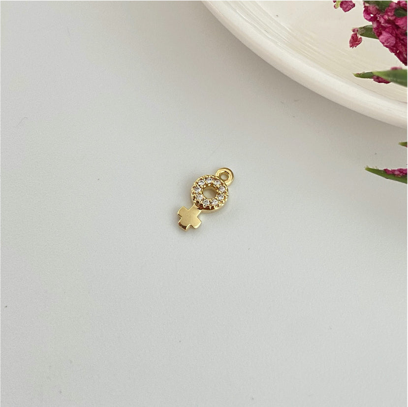FO977 Colgante símbolo Sexo Femenino con micro circones 9x5 mm más argollita Figura Baño Oro Figuras Bañadas hecho de Bronce Bañado en Oro 18K Joyas Bañadas en Oro