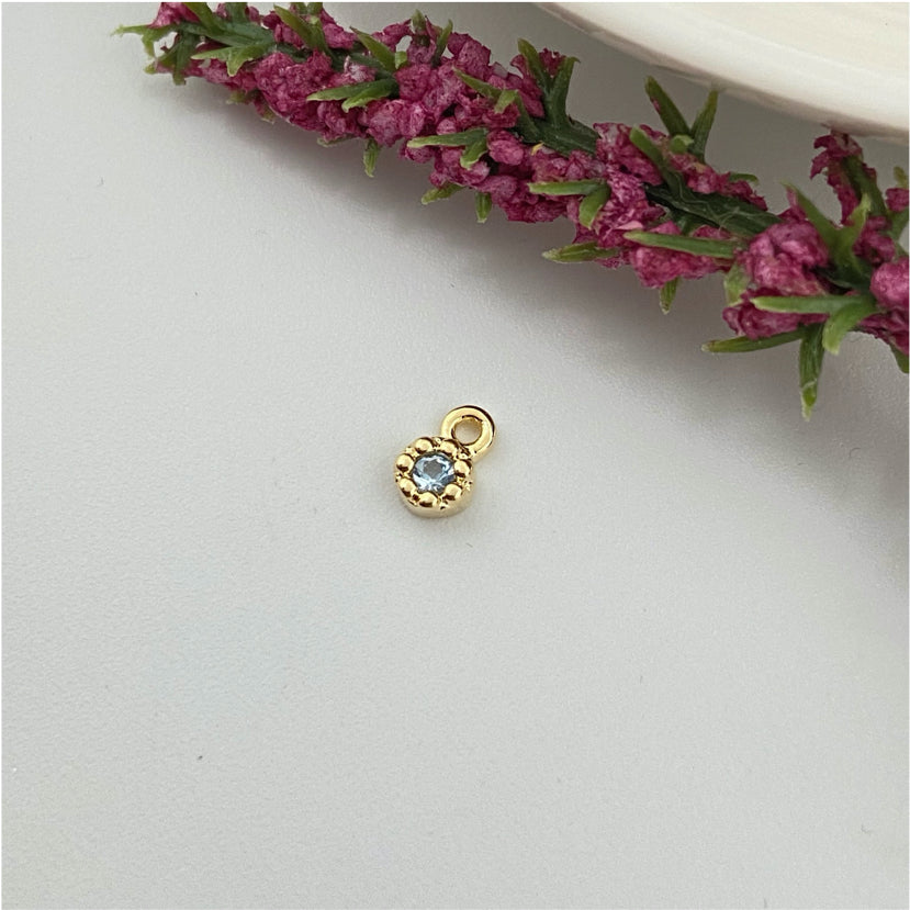 FO980 Colgante Punto de Luz Mini Flor Circón Aguamarina Diá. 4 mm Espesor 2 mm Más argollita Figura Baño Oro Figuras Bañadas hecho de Bronce Bañado en Oro 18K Joyas Bañadas en Oro
