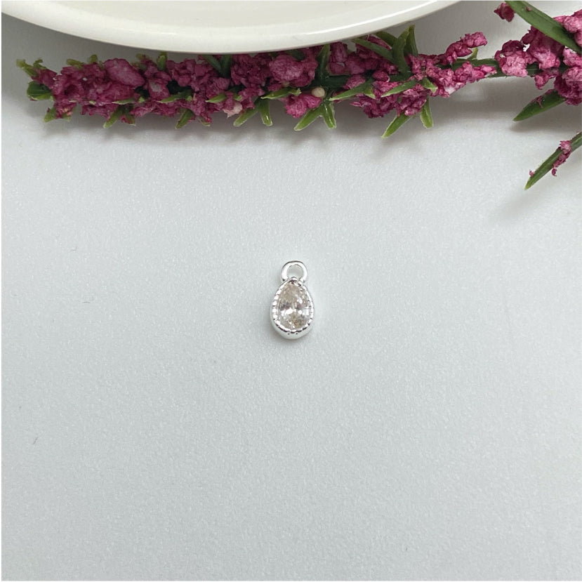 FP974 Colgante Punto de Luz Gota Borde Acanalado 5x3 mm mas argollita Figura Baño Plata Figuras Bañadas hecho de Bronce Bañado en Plata 50 ml Joyas Bañadas en Plata