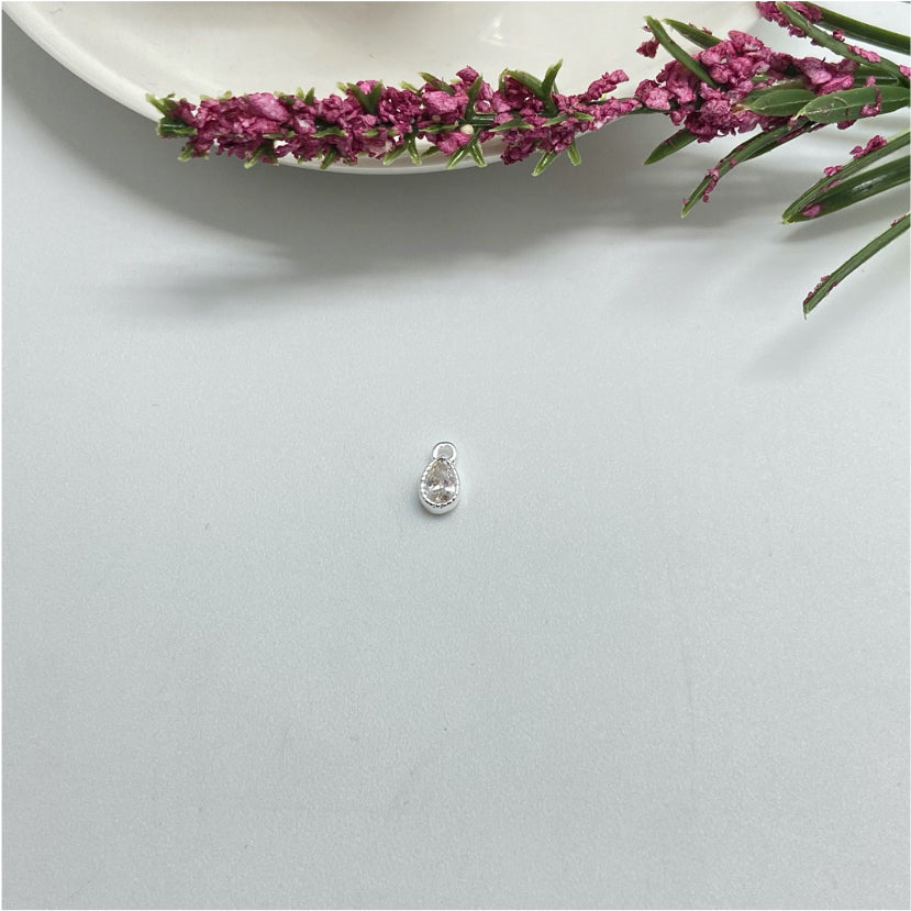 FP974 Colgante Punto de Luz Gota Borde Acanalado 5x3 mm mas argollita Figura Baño Plata Figuras Bañadas hecho de Bronce Bañado en Plata 50 ml Joyas Bañadas en Plata