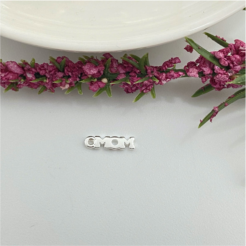 FP975 Colgante MOM 10x3 mm mas argollita Figura Baño Plata Figuras Bañadas hecho de Bronce Bañado en Plata 50 ml Joyas Bañadas en Plata