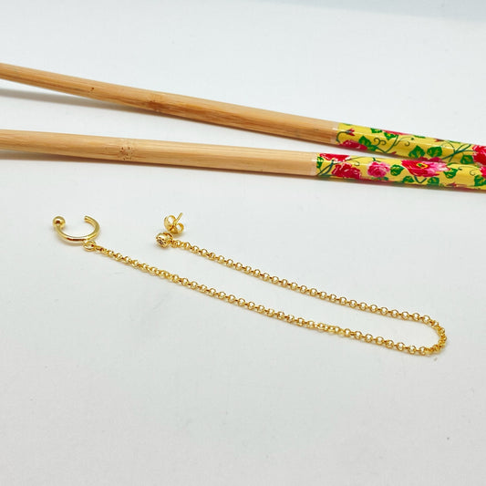 XO303 Cuff argollita con 1 bolita y aro punto de luz 4 mm borde rutilado unidos por cadena de 18 cm largo Aro Baño Oro