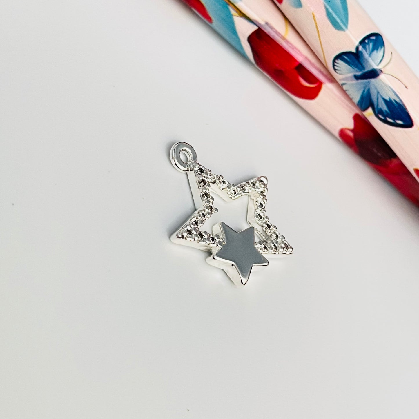 FP906 Colgante Estrella Circones y Mini Estrella Lisa 15x15 mm más argollita Figura Baño Plata