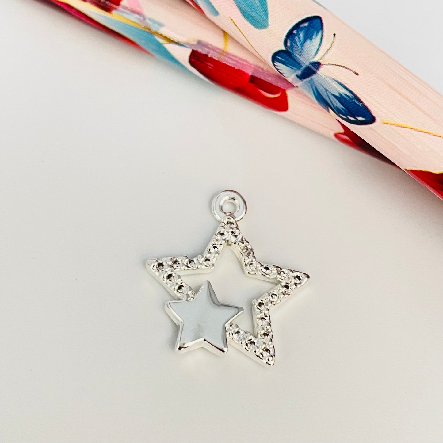 FP906 Colgante Estrella Circones y Mini Estrella Lisa 15x15 mm más argollita Figura Baño Plata
