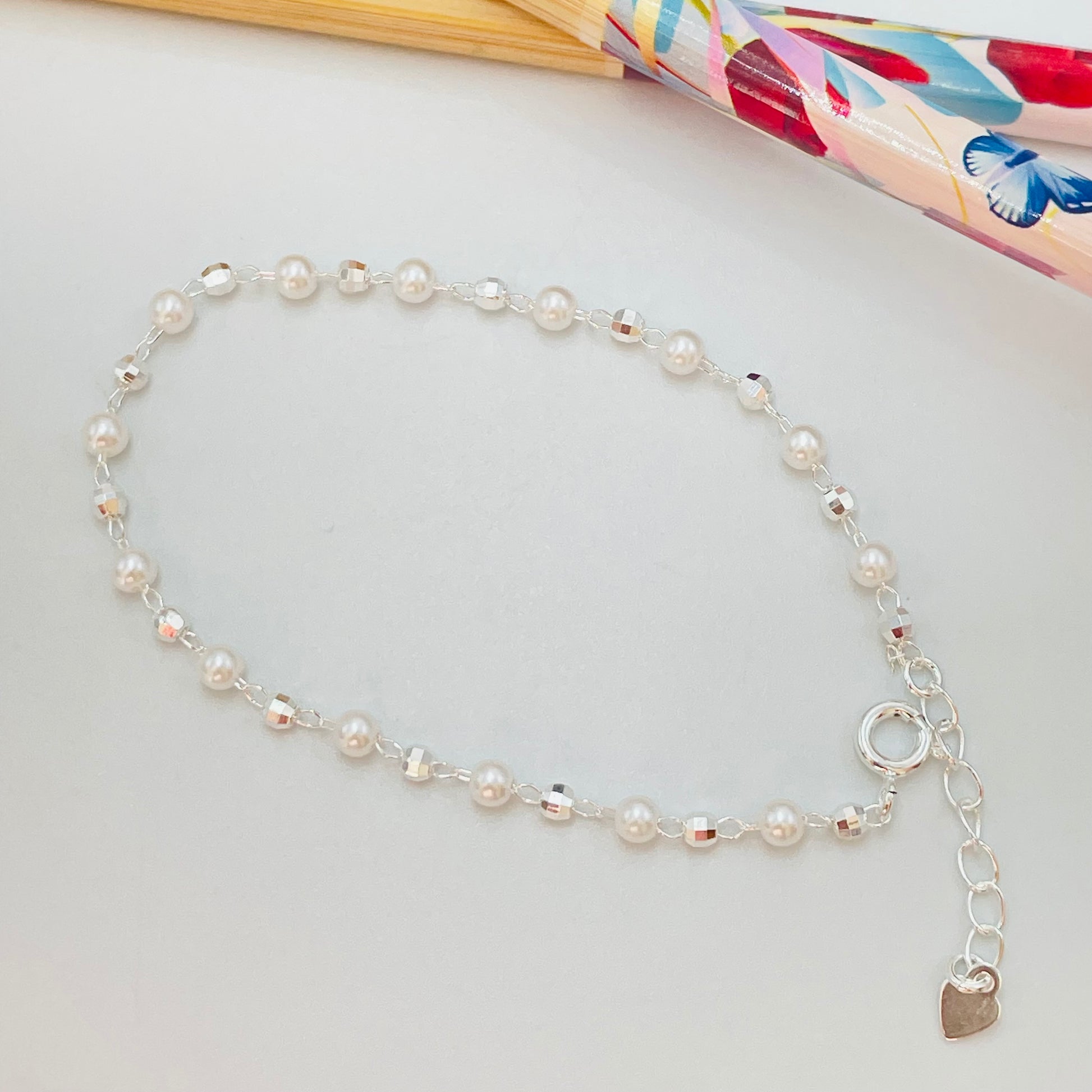 Joyas por Mayor Joyas Bañadas en Plata por Mayor Insumos para Joyas PP25 Pulsera Perlas diá. 3.5 mm y bolitas facetadas 2.8 mm Largo 17.5 cm más extensor con terminal mini corazón Pulsera Baño Plata