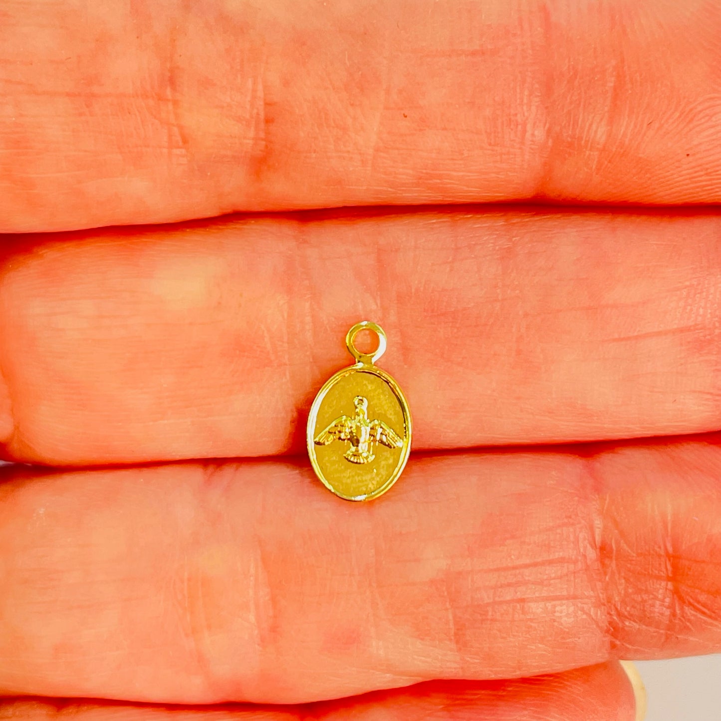 Joyas por Mayor Joyas Bañadas en Oro por Mayor Insumos para Joyas FO1211 Mini Colgante Ovalado Espíritu Santo 9 x 7 mm más Argollita Espesor 1 mm Figura Baño Oro