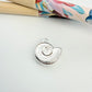FP1271 Colgante Caracola 13 x 16 mm más argollita Espesor 4.5 mm Figura Baño Plata