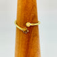 WO49 Anillo Ajustable Estrella 5 mm y Punto de Luz 3.5 mm en puntas Ancho Argolla 1.5 mm Anillo Baño Oro