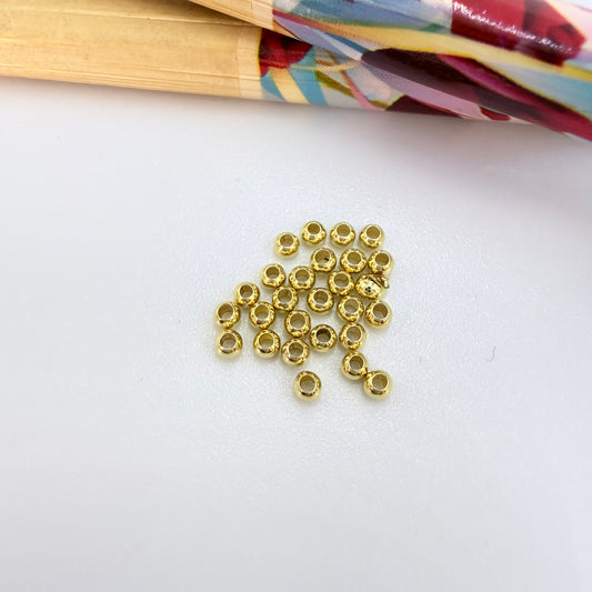Joyas por Mayor Joyas Bañadas en Oro por Mayor Insumos para Joyas MO52 Bolitas 2 mm Perforación 1 mm Venta por Gramo Accesorio Baño Oro