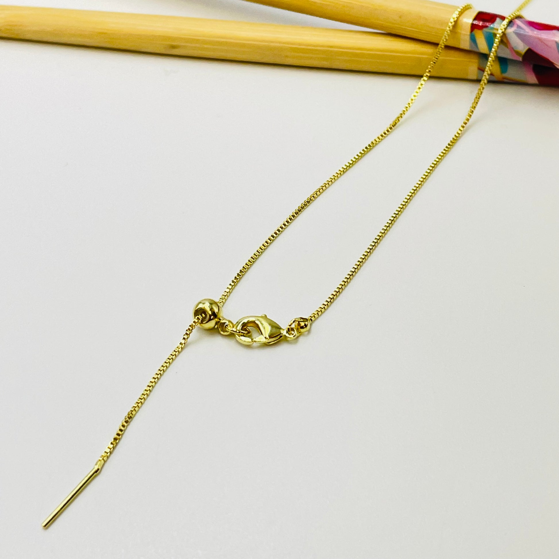 Joyas por Mayor Joyas Bañadas en Oro por Mayor Insumos para Joyas CO209 Cadena Veneciana de 1mm con bolita con silicona y palito Cadena Terminada Baño Oro