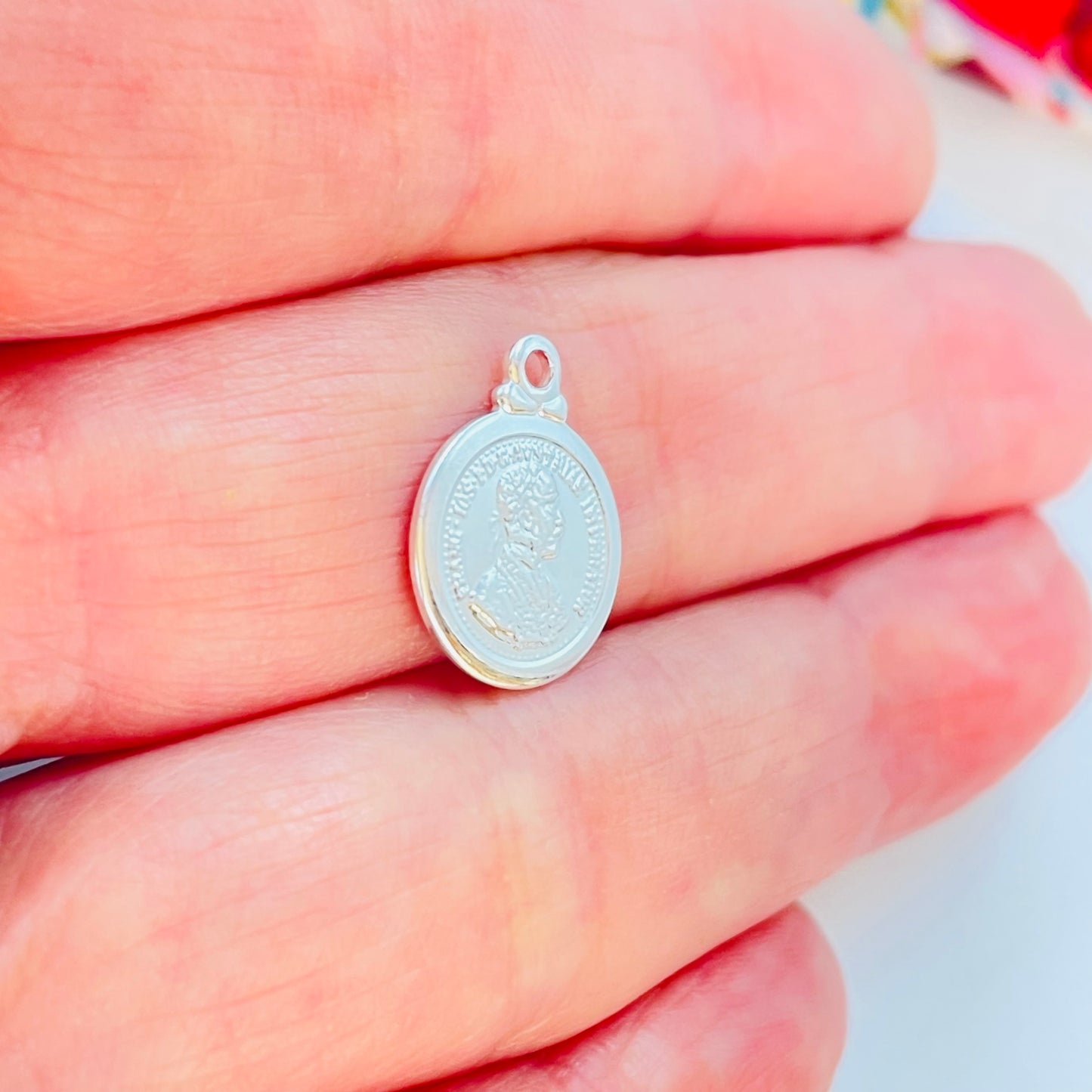FP1193 Colgante Moneda Austriaca Doble Faz Borde Liso Diá. 11 mm más argollita Espesor 1 mm Figura Baño Plata