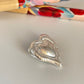 FP1131 Colgante Corazón Bordes irregulares corazón central en relieve dos argollas posteriores 20 x 16 mm Espesor 2 mm Figura Baño Plata