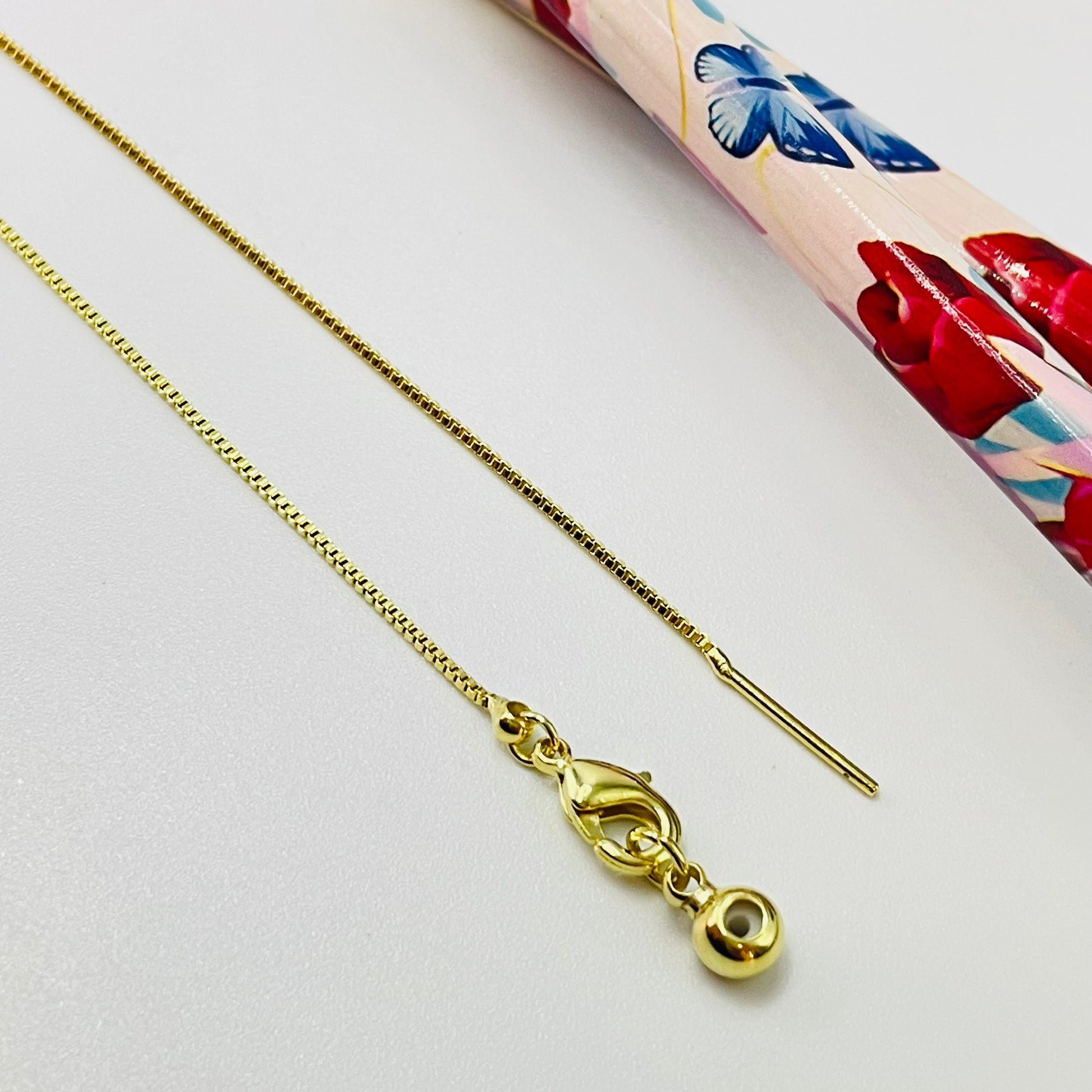 Joyas por Mayor Joyas Bañadas en Oro por Mayor Insumos para Joyas CO209 Cadena Veneciana de 1mm con bolita con silicona y palito Cadena Terminada Baño Oro