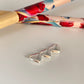 FP1142 Colgante o Conector 3 Corazones Unidos y dos argollas 7 x 22 mm más argollitas Espesor 2.2 mm Figura Baño Plata Figuras Bañadas hecho de Bronce Bañado en Plata 50 ml Joyas Bañadas en Plata