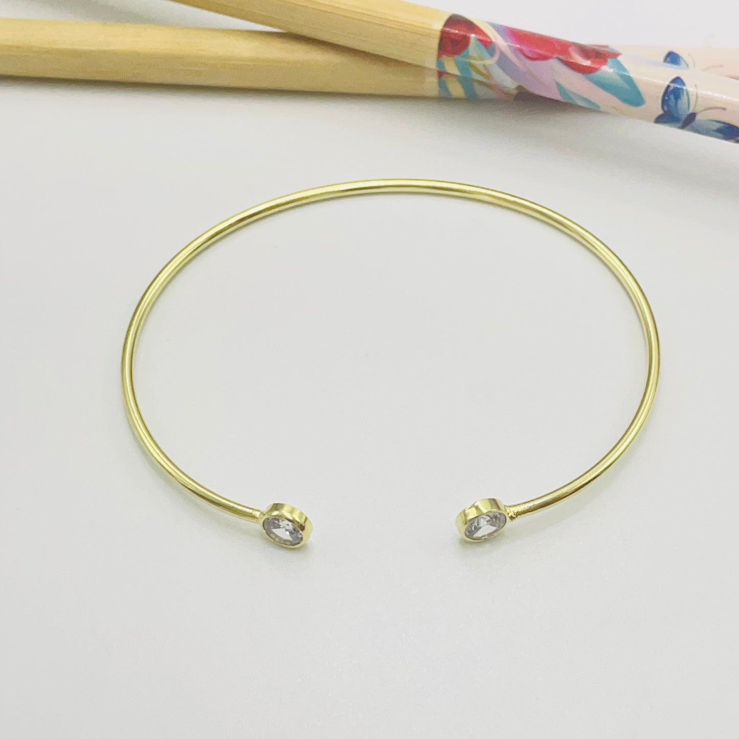 Joyas por Mayor Joyas Bañadas en Oro por Mayor Insumos para Joyas EO30 Esclava 2 puntos de luz en puntas de 5.5 mm 60 x 50 mm Espesor tubo 1.8 mm Esclava Baño Oro