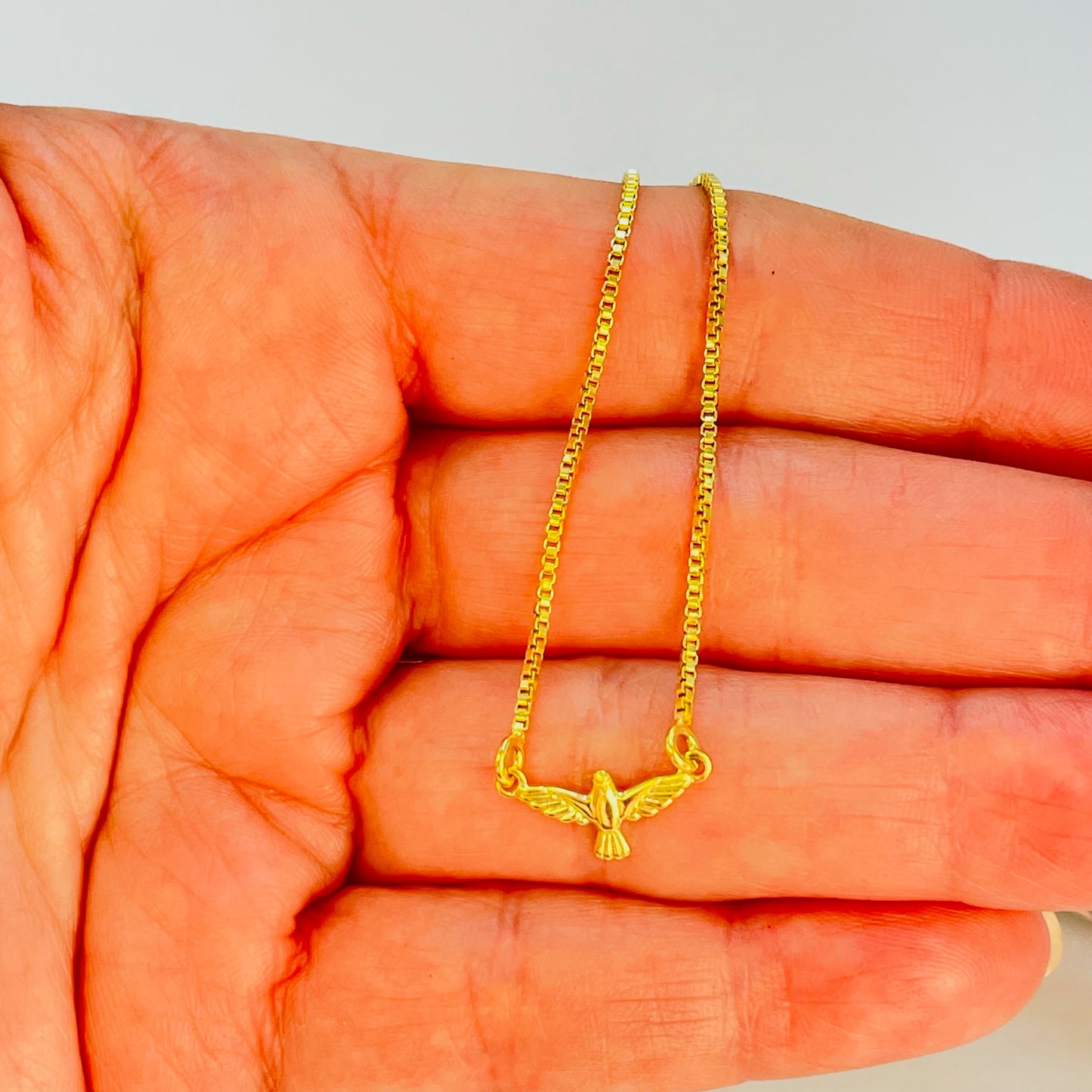 PO27 Pulsera Regulable Espíritu Santo 8 x 15 mm Espesor 1 mm Cadena Veneciana Espesor 1 mm Largo 23 mm Bolita Silicona Terminales Corazón Pulsera Baño Oro