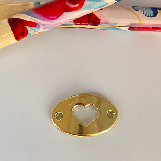 FO1128 Conector Ovalado Corazón Calado con perforaciones 12 x 20 mm Espesor 1.8 mm Figura Baño Oro