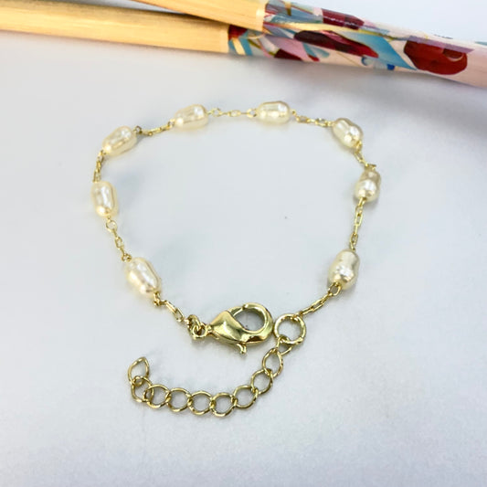 Joyas por Mayor Joyas Bañadas en Oro por Mayor Insumos para Joyas PO35 Pulsera con Perlas tipo Río de 7x5 mm Largo 15 cm más extensor de 4.5 cm Pulsera Baño Oro