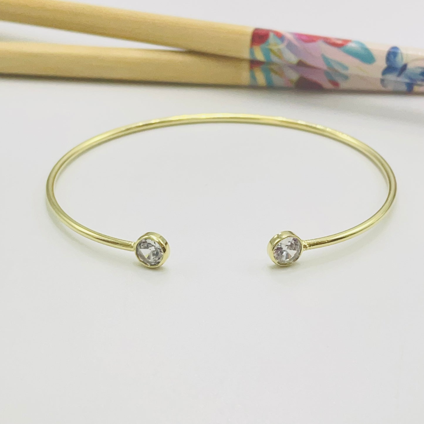 Joyas por Mayor Joyas Bañadas en Oro por Mayor Insumos para Joyas EO30 Esclava 2 puntos de luz en puntas de 5.5 mm 60 x 50 mm Espesor tubo 1.8 mm Esclava Baño Oro