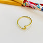 WO49 Anillo Ajustable Estrella 5 mm y Punto de Luz 3.5 mm en puntas Ancho Argolla 1.5 mm Anillo Baño Oro