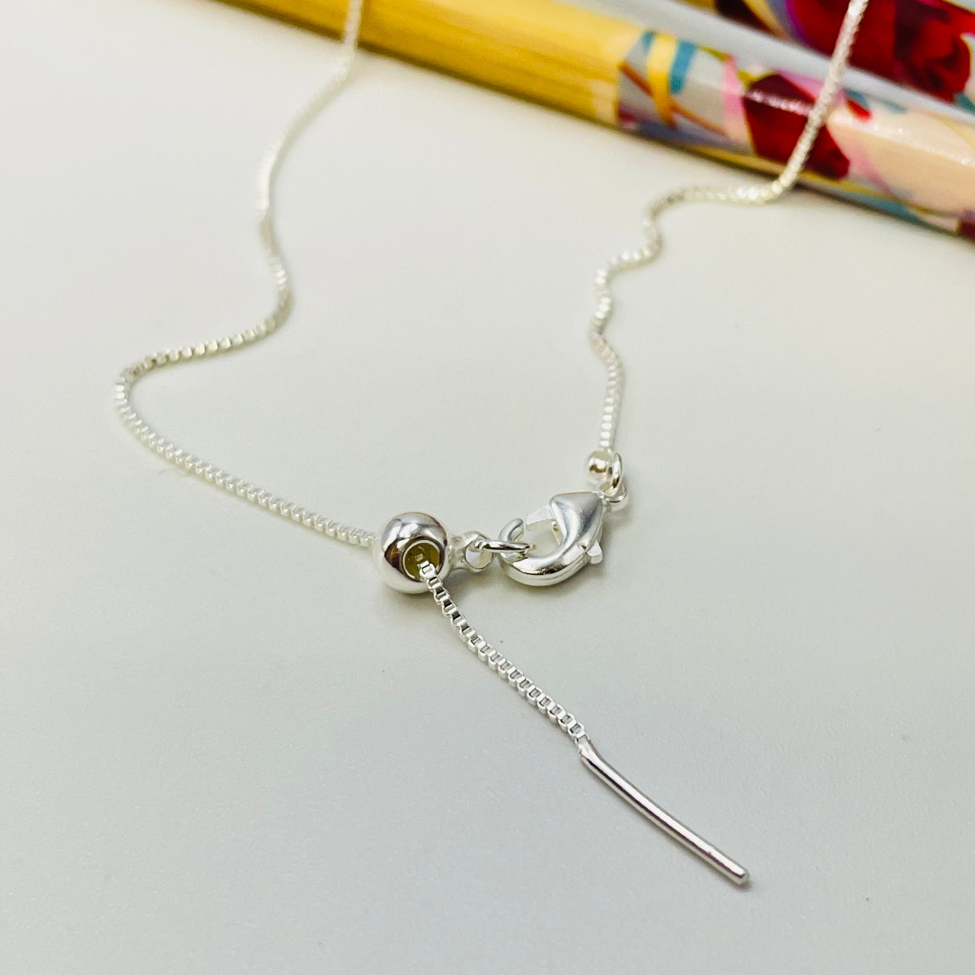 Joyas por Mayor Joyas Bañadas en Plata por Mayor Insumos para Joyas CP209 Cadena Veneciana de 1mm con bolita con silicona y palito Cadena Terminada Baño Plata