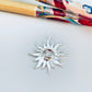 FP1215 Colgante Sol 25 x 25 mm más argollita Espesor 1.1 mm Figura Baño Plata