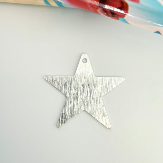 Joyas por Mayor Joyas Bañadas en Plata por Mayor Insumos para Joyas FP1278 Colgante Estrella Lijada 20 mm con perforación Espesor 0.6 mm Figura Baño Plata