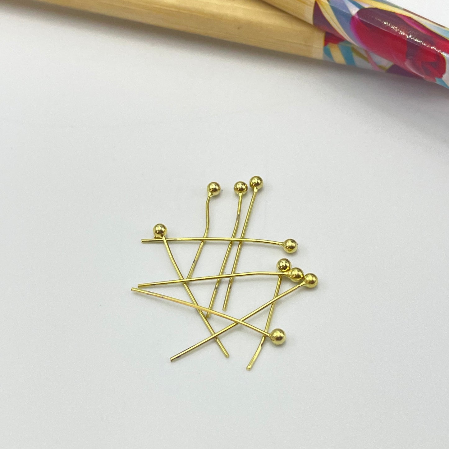 AO29 Vastago con bolita 23 mm Accesorio Baño Oro