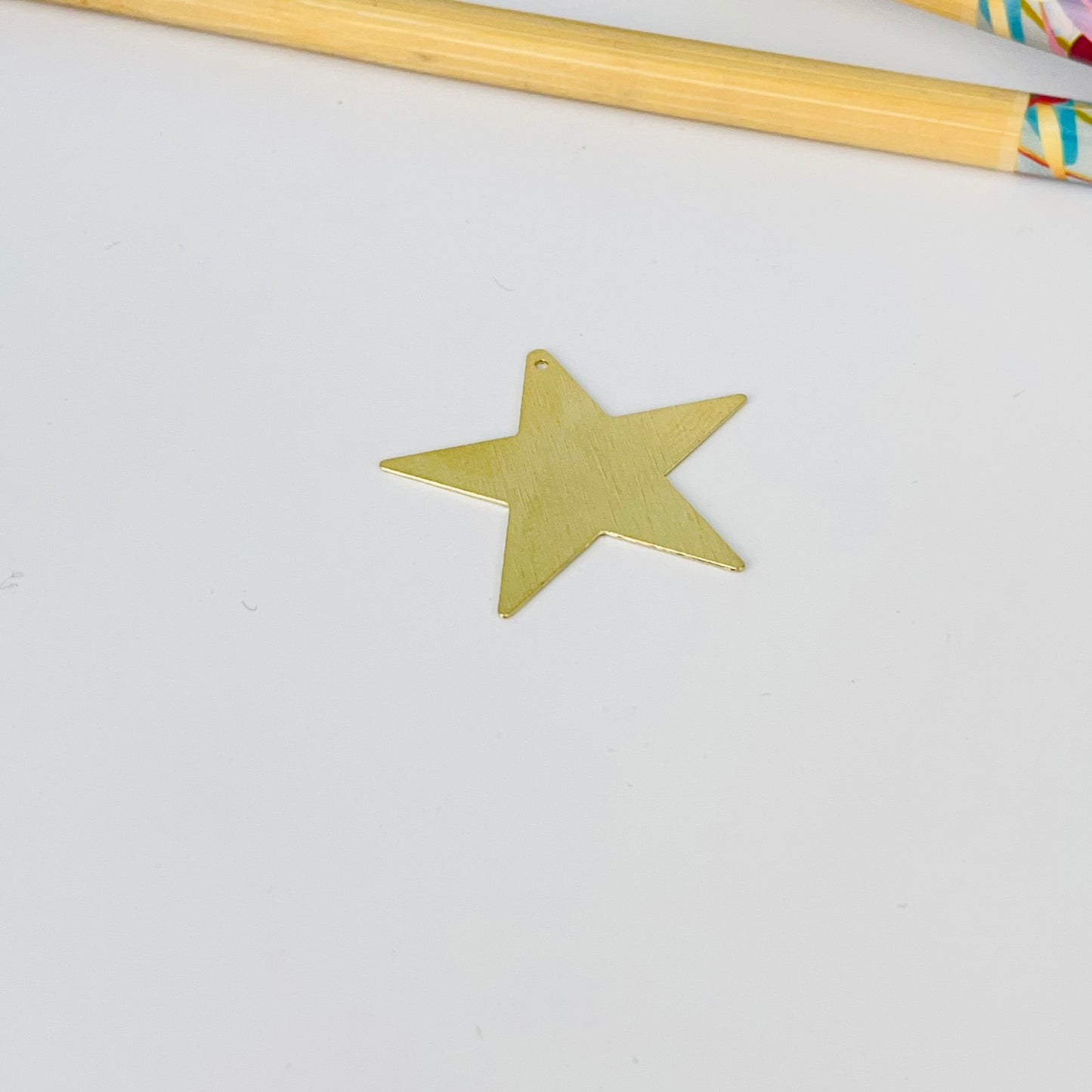 FO1277 Colgante Estrella Lijada 30 mm con perforación Espesor 0.6 mm Figura Baño Oro