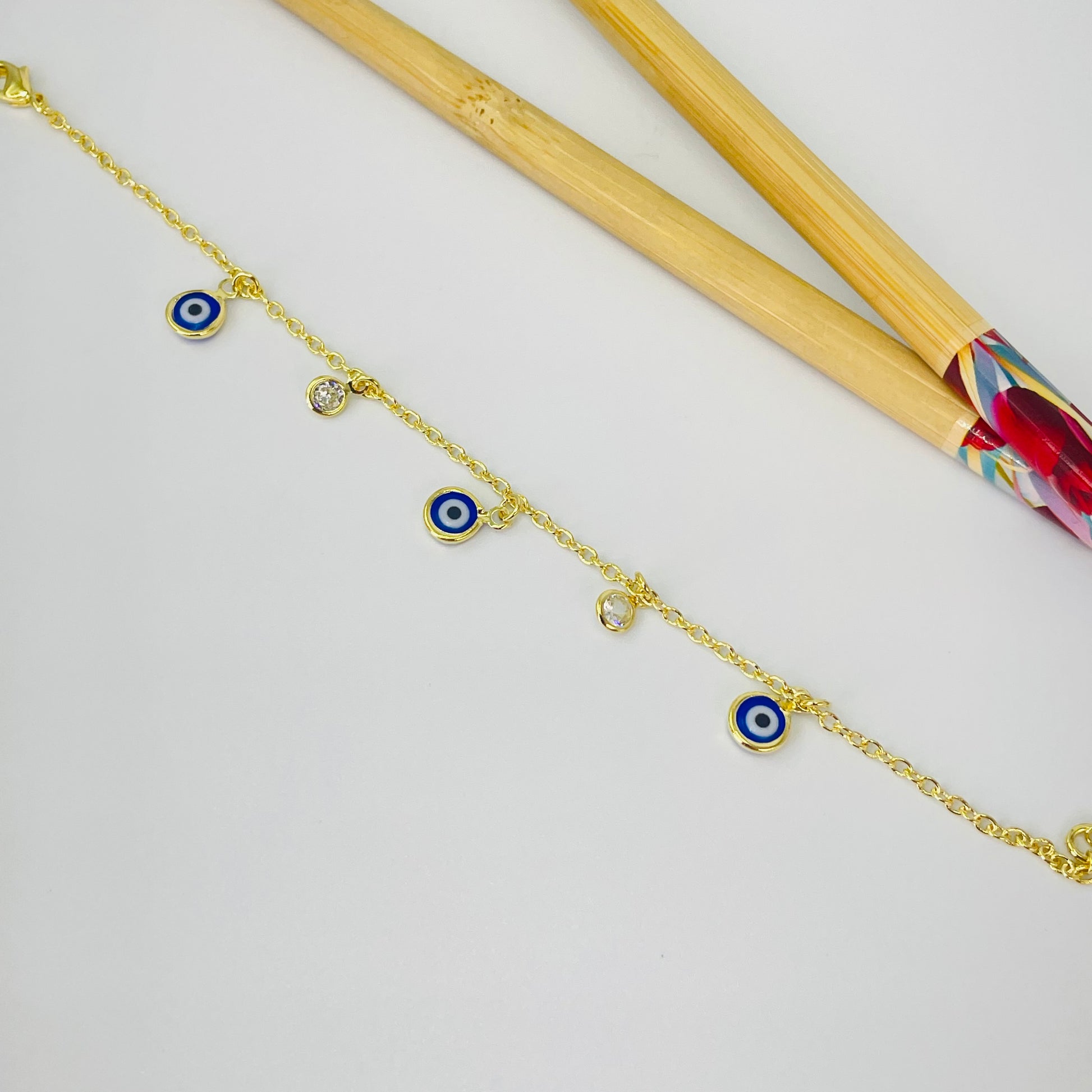 Joyas por Mayor Joyas Bañadas en Oro por Mayor Insumos para Joyas PO38 Pulsera Ojos Griegos diá. 6 mm y Puntos de Luz diá. 5 mm Cadena Candado Eslabón 2 mm Largo 16 cm más Extensor 5 cm Pulsera Baño Oro