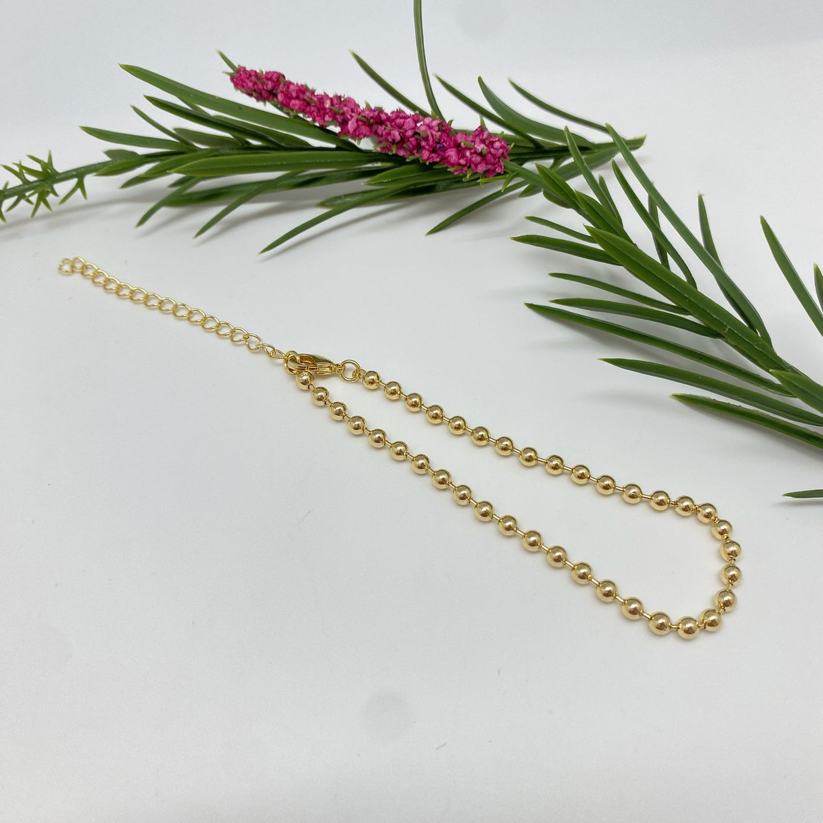 PO46 Pulsera de bolitas 3 mm y mini tubitos Largo 17 cm más extensor de 5 cm  Pulsera Baño Oro