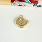 FO1271 Colgante Caracola 13 x 16 mm más argollita Espesor 4.5 mm Figura Baño Oro