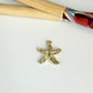 FO1274 Colgante Estrella de Mar 14 x 14 mm más argollita Espesor 1.5 mm Figura Baño Oro