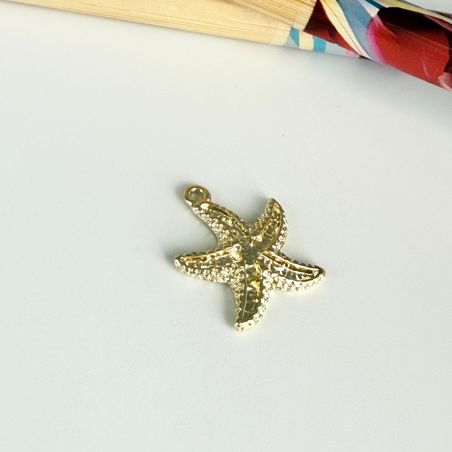 FO1274 Colgante Estrella de Mar 14 x 14 mm más argollita Espesor 1.5 mm Figura Baño Oro