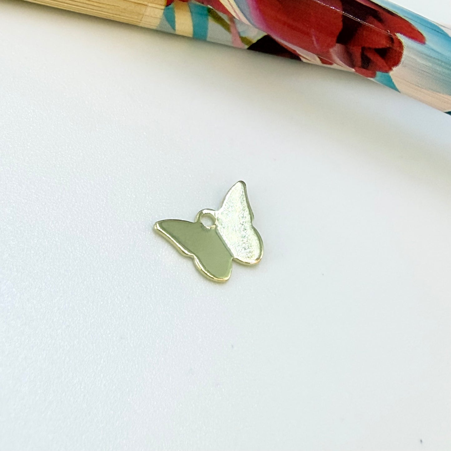 FO1256 Colgante Mariposa 7.5 x 10 mm Espesor 0.9 mm Figura Baño Oro