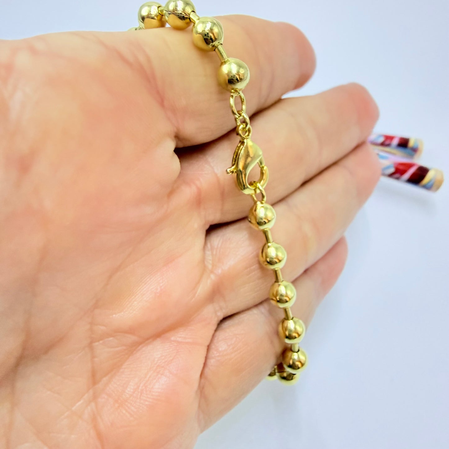 PO41 Pulsera Bolitas diá. 5 mm y Tubitos 1.2 mm Largo Total 18 cm Pulsera Baño Oro