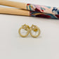 XO366 Aro Estrella con 1 circón 5 mm y argolla texturada Diá. 9.2 mm Tamaño Total 12.2 x 9 .2 mm Aro Baño Oro Aros Bañados hecho de Bronce Bañado en Oro 18K Joyas Bañadas en Oro
