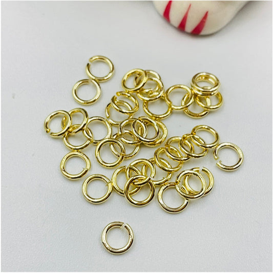 AO115 Argolla abierta diá. 5 mm Espesor 0.8 mm Accesorio Baño Oro Accesorios Bañados hecho de Bronce Bañado en Oro 18K Joyas Bañadas en Oro