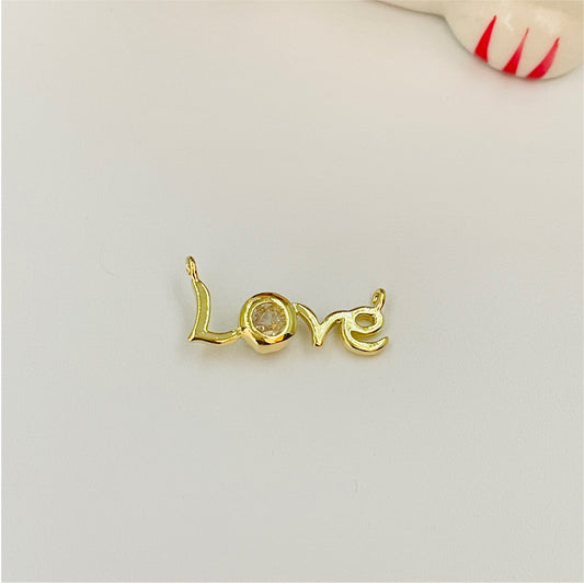 FO833 Colgante Love con 1 circón 6x18 mm con 2 argollitas Figura Baño Oro Figuras Bañadas en Oro y Plata hecho de Bronce Bañado en Oro 18K