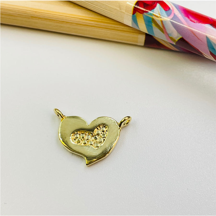 FO881 Colgante o Conector Corazón ladeado centro reticulado 13x10 mm con 2 argollitas Figura Baño Oro Figuras Bañadas en Oro y Plata hecho de Bronce Bañado en Oro 18K Joyas Bañadas en Oro